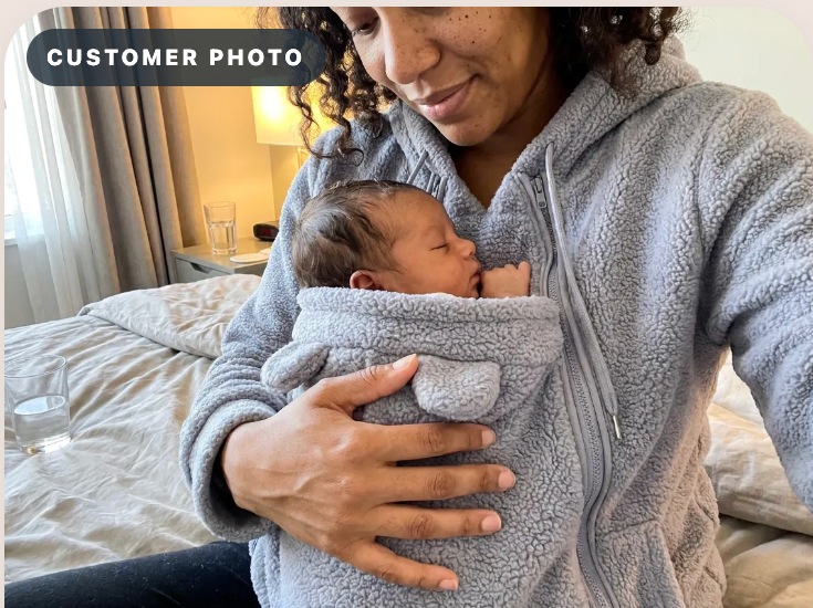 Parent wearing fleece indoors